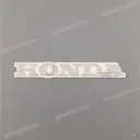 Emblema NX carenatura superiore