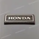 Emblema parafango posteriore