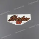 Emblema de tapa lateral