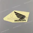 Front side cover wing emblem, right side