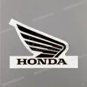 Emblema ala Honda sul serbatoio, lato destro