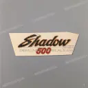 Side cover emblem, left side
