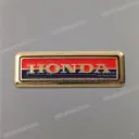 Rear cowl emblem