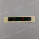 Swingarm chain adjuster label