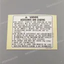 Accessories and loading caution label, left side