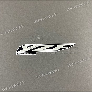 Front upper cowling YAMAHA emblem, left side