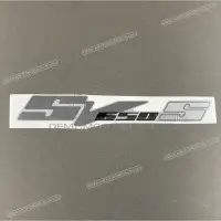 SUZUKI Emblemat na owiewkę SV650S X6828117G00ML4