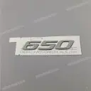 Pegatina emblema 650 de tapa lateral