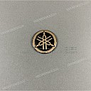 Emblema Yamaha de diapasón