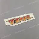 Emblema para tapa lateral TDR125