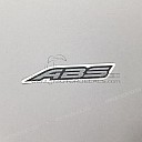 Emblemat ABS przedniego błotnika