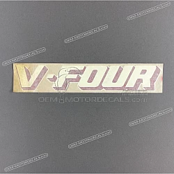 Under cowl emblem