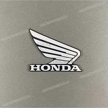 Front cowling wing emblem, right side