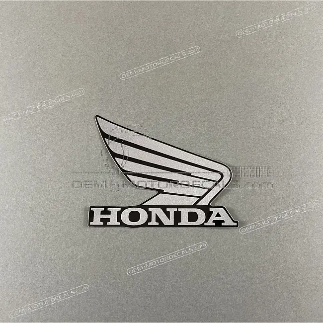 Honda CB125R Emblemat Wing na prawą owiewkę Prawa Strona OEM 86201K98E00ZD