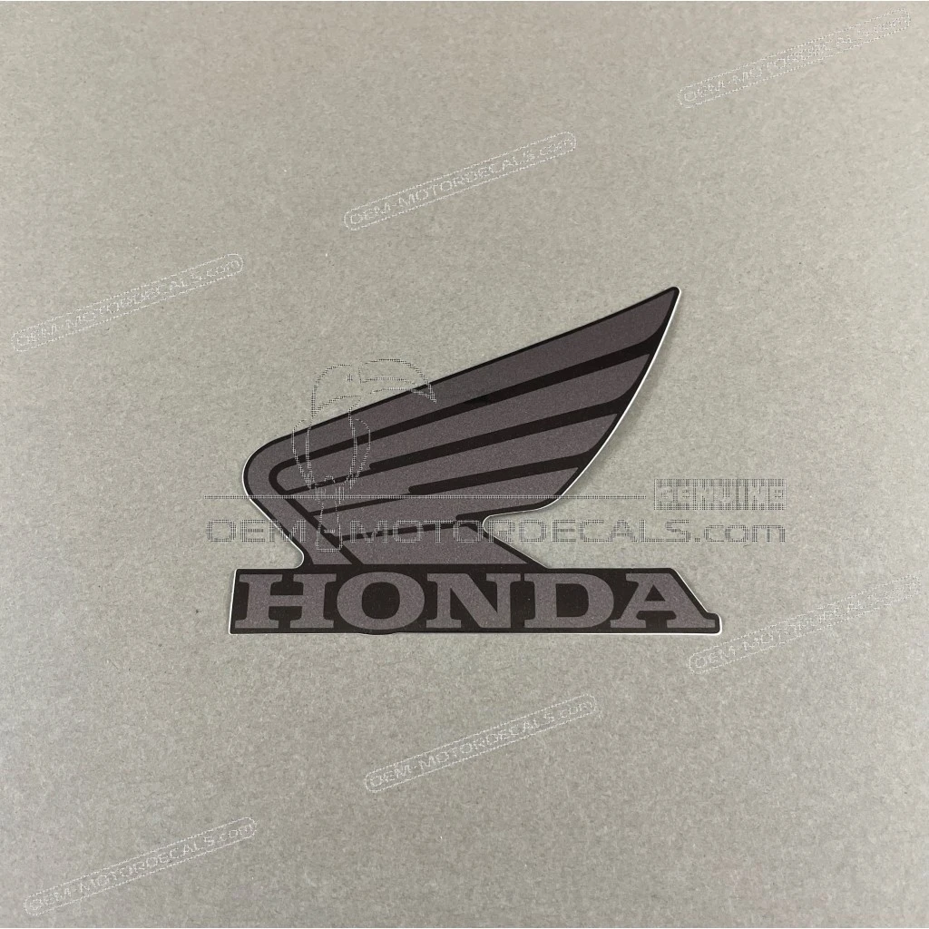 Honda CMX500 Rebel Emblemat Honda Wing na pokrywę boczną lewa strona OEM 86202K2YA20ZD