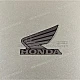 Honda CMX500 Rebel Emblemat Honda Wing na pokrywę boczną lewa strona OEM 86202K2YA20ZD