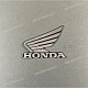 Honda CB125R Linke Verkleidung Honda Wing Emblem links OEM 86202K98E00ZC