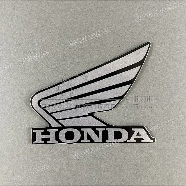 Honda CB125R Linker Flügel Honda Flügel Emblem linke Seite OEM 86202K98E00ZD