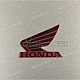 Honda CB125R Naklejka na owiewkę lewa strona OEM 86202K98E50ZA