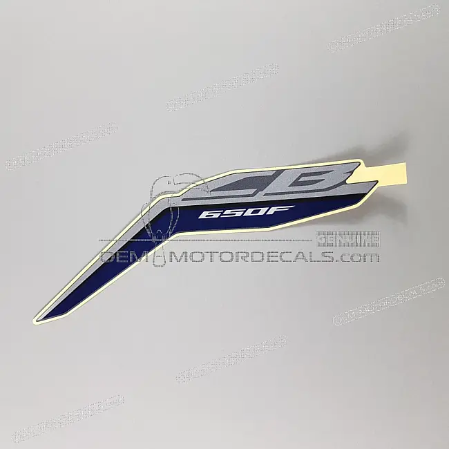 Original Honda CB650F Kühlerverkleidungsaufkleber linke Seite OEM 86642MJEDF0ZA werkseitig originale Vinylgrafik für Seitenverkleidung.
