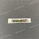 Honda CBF125 Naklejka napinacza łańcucha lewa strona OEM 87508MEL640