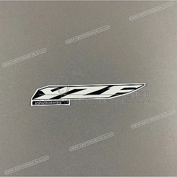 Emblema YAMAHA carenado frontal superior, lado izquierdo