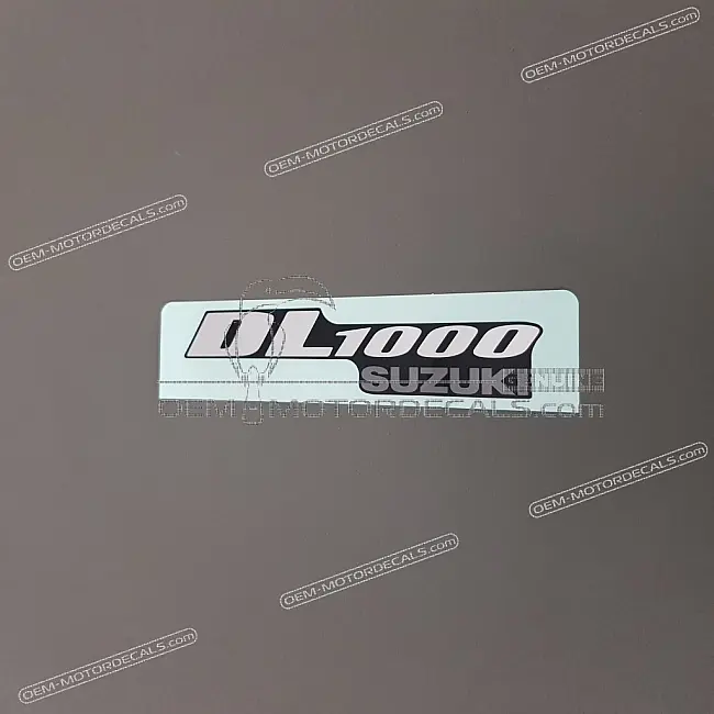 Emblème Suzuki DL1000 V-Strom Coque Arrière Siège OEM 6816106G10BKT