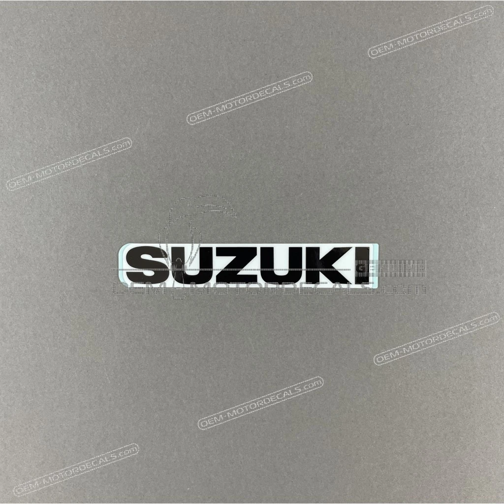 Suzuki RM125 Koplampafdekking Embleem OEM 6817144B008YM