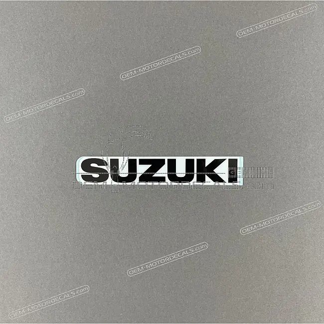 Suzuki RM125 Emblema Cubierta Faro OEM 6817144B008YM