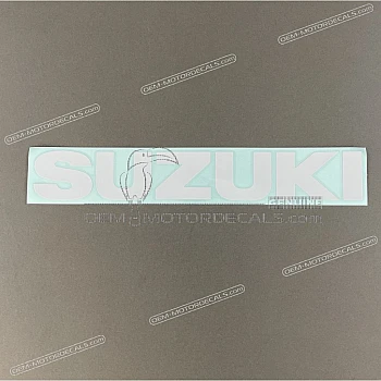 Under cowling SUZUKI emblem, right side