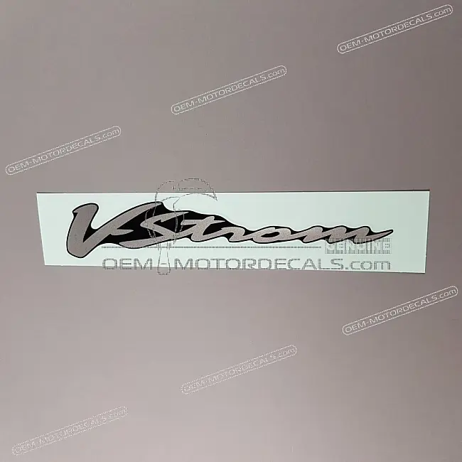 Suzuki DL650 V-Strom Side Cowl V-Strom Emblem OEM 6868127G00AML