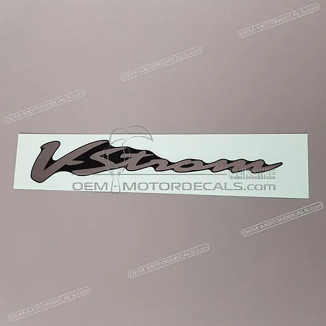 Suzuki DL1000 V-Strom Emblema per carenatura laterale V-Strom OEM 6868127G00DWV