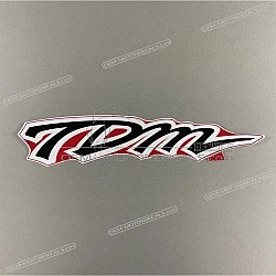 Left fairing TDM emblem, left side