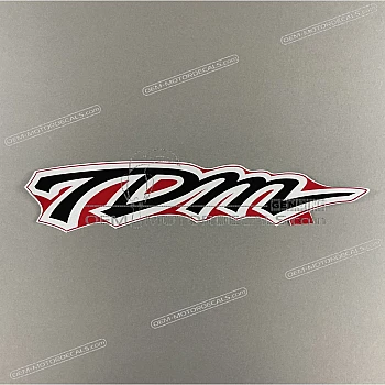 Left fairing TDM emblem, left side